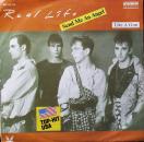 Real Life	- Send Me An Angel / Like A Gun - 7"